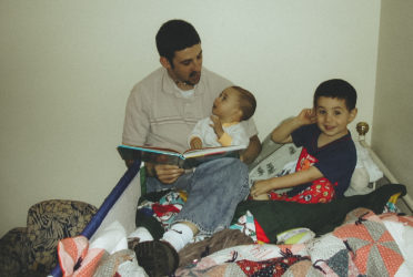 Michael Doig reading to his sons - Nevan and Liam