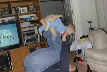 Michael Doig playing with his son, Liam