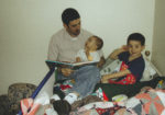 Michael Doig reading to his sons - Nevan and Liam