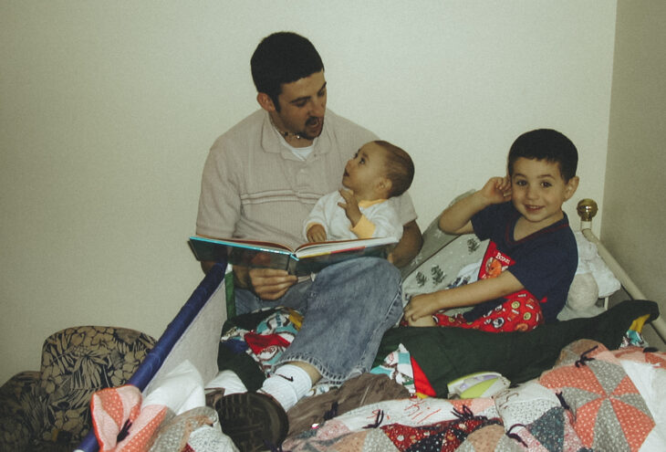 Michael Doig reading to his sons - Nevan and Liam