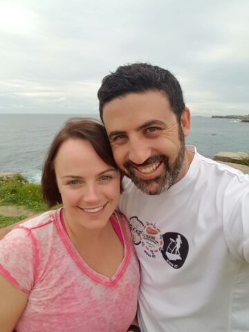 Michael Doig & Louise Connolly hiking by the beach