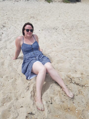 Louise Connolly relaxing on the beach during our Victorian Road Trip