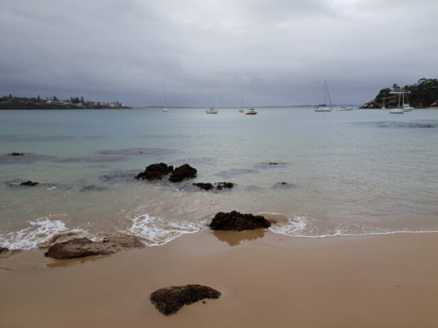Relaxing by the beach after our mountain bike ride