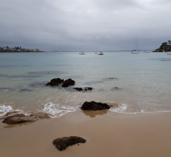 Relaxing by the beach after our mountain bike ride