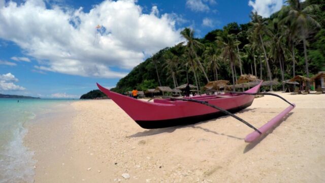 You see all manner of craft pull up to the shores of Puka Beach— at Puka Beach, Boracay Island