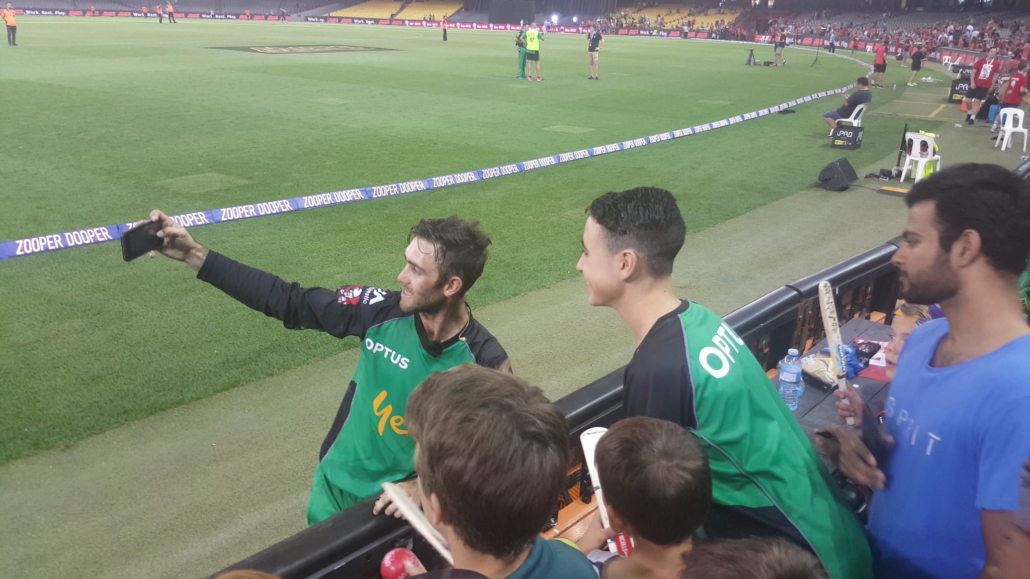 Glenn Maxwell takes a selfie with Liam Doig