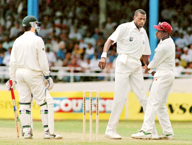 Curtly Ambrose and Steve Waugh