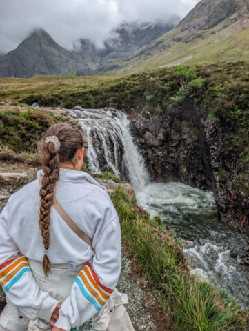 Katherine taking a moment to take in the Fairy Pools, Isle of Skye