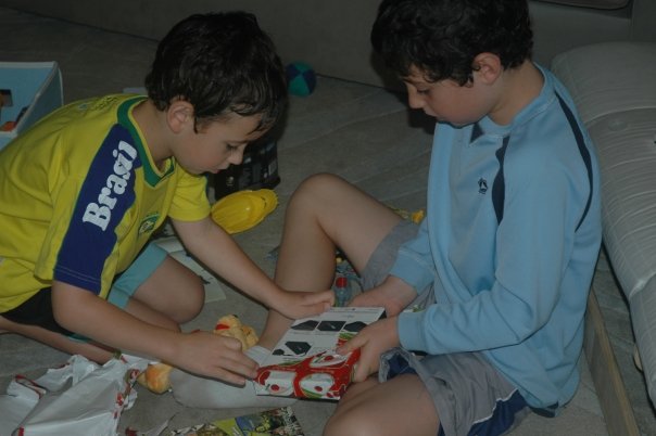 Hayden's First Christmas - Nevan and Liam unwrapping