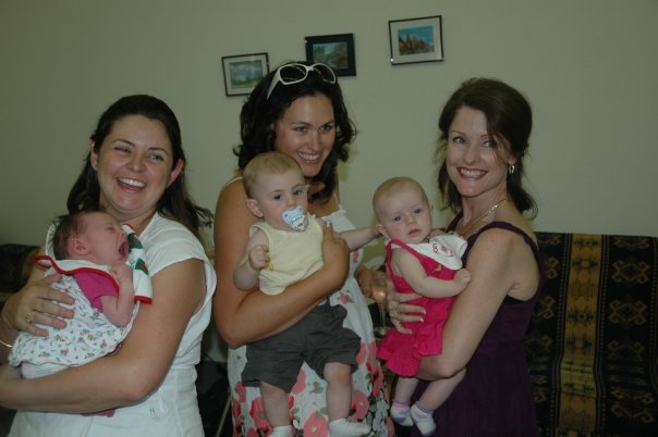 Doig Family Christmas 2008 - Michelle Hearn, Jenifer Doig and Penny Doig holding babies